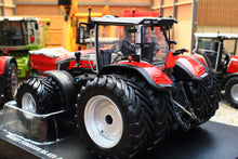 Load image into Gallery viewer, Red Massey Ferguson 9S.425 4WD tractor model with dual wheels, a 1:32 scale agricultural model by Universal Hobbies displayed with other tractors