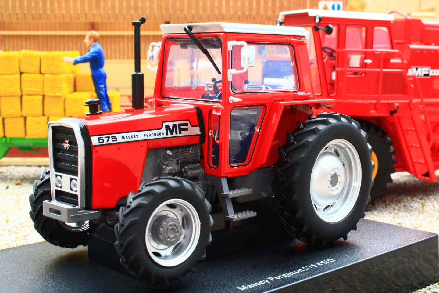 UH6701 Universal Hobbies 1:32 Scale Massey Ferguson 575 4WD Tractor with wide rear tyres Red Cab version