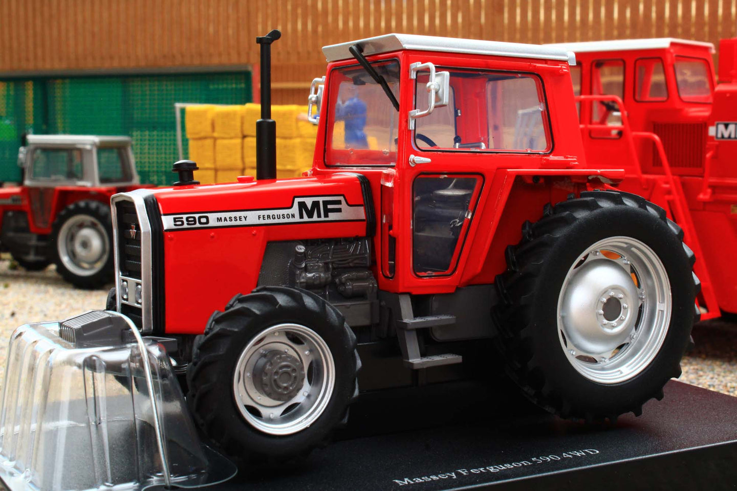 UH6764 Universal Hobbies 1:32 Scale Massey Ferguson 590 4WD Tractor with wide rear tyres Red Cab version