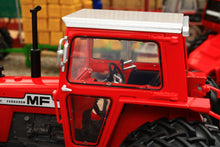 Load image into Gallery viewer, UH6765 Universal Hobbies 1:32 Scale Massey Ferguson 575 4WD Tractor with Molcon Duals Red Cab version