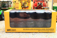 Load image into Gallery viewer, Universal Hobbies 1:32 scale box of 20 black wrapped round silage bales. Only the bales are included. Farm machinery shown behind is not included.