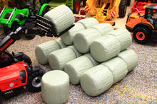 Load image into Gallery viewer, Universal Hobbies 1:32 scale set of 20 green wrapped round silage bales for farm dioramas with only the bales included and no tractors or machinery