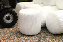 Load image into Gallery viewer, Universal Hobbies 1:32 scale white wrapped round silage bales for farm dioramas, with only the bales included and no tractor or other accessories