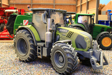 Load image into Gallery viewer, 43422(W) Weathered Britains Claas Arion 660 Limited Night Edition