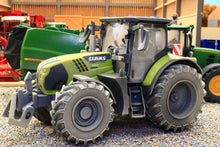 Load image into Gallery viewer, 43422(W) Weathered Britains Claas Arion 660 Limited Night Edition