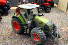 Load image into Gallery viewer, 43374(w) Weathered Britains Claas Arion 660 Tractor DUSTY VERSION