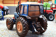 Load image into Gallery viewer, 43409(w) Weathered Britains Ford 8700 4WD Special Edition in Blue DIRTY VERSION