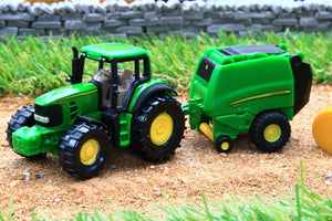 1665 SIKU 187 SCALE JOHN DEERE TRACTOR WITH ROUND BALER