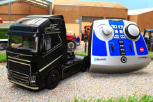 Load image into Gallery viewer, 6737 + 6734 SIKU RADIO CONTROLLED VOLVO FH16 LORRY WITH BLUETOOTH HAND CONTROLLER AND SCHMITZ CARGO BULL 3 AXLE TRAILER