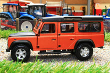 Load image into Gallery viewer, BUR430290 BURAGO 132 SCALE LAND ROVER DEFENDER 110 STATION WAGON IN ORANGE AND BLACK