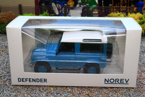 NOV845107 Norev 1:43 Scale Land Rover Defender 90 in Blue & White 1995