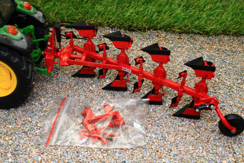 REP103 - Charrue CASE IH 155 4 corps - Replicagri - 1/32 REP103 - Charrue CASE IH 155 4 corps - Replicagri - 1/32