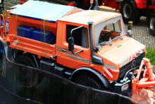 Load image into Gallery viewer, SCH07724 SCHUCO MERCEDES BENZ UNIMOG WITH SNOW PLOUGH AND SALT SPREADER - WINTER WEATHERED