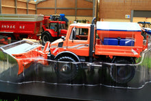 Load image into Gallery viewer, SCH07724 SCHUCO MERCEDES BENZ UNIMOG WITH SNOW PLOUGH AND SALT SPREADER - WINTER WEATHERED