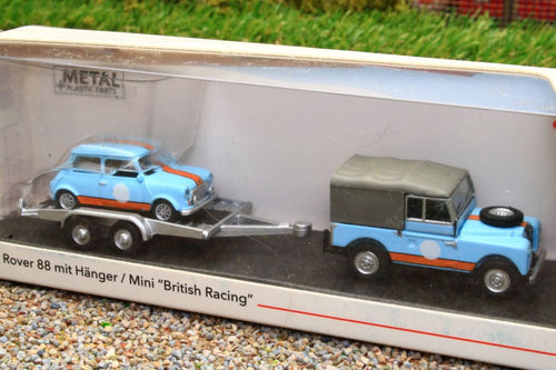 SHU26595 Schuco 1:87 Scale Land Rover 88 with Mini on trailer in Gulf Colours