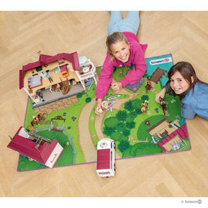 Children playing with the SL42465 Schleich Horse Club - Play Mat
