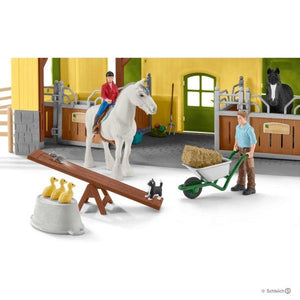 Close up of horse and seesaw for the SL42485 Schleich Farm World Stable with Figures, Anamals and Accessories
