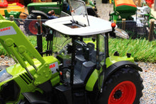 Load image into Gallery viewer, W7325 WIKING CLAAS ARION 650 TRACTOR WITH FRONT LOADER AND BUCKET