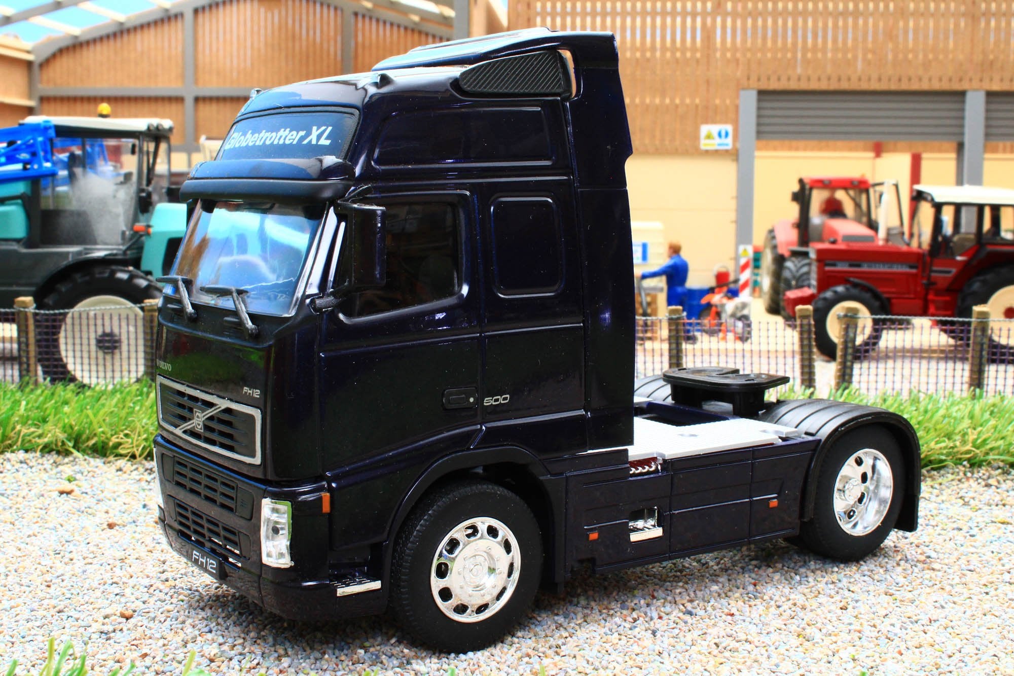 WEL32630B WELLY 132 SCALE VOLVO FH12 4X2 LORRY IN DARK BLUE